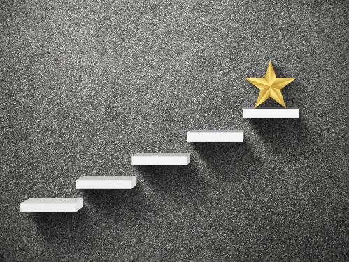 stylistic photo of a star on a step ladder representing an award