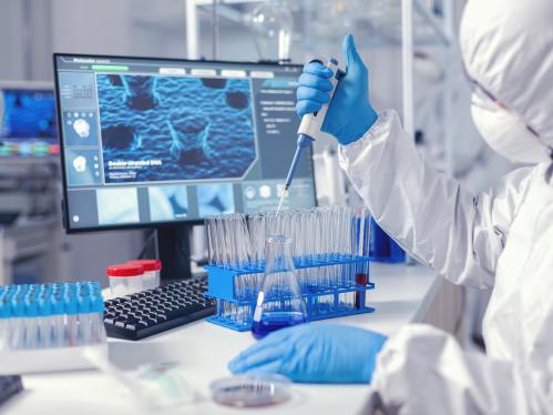 laboratory researcher performing experiment